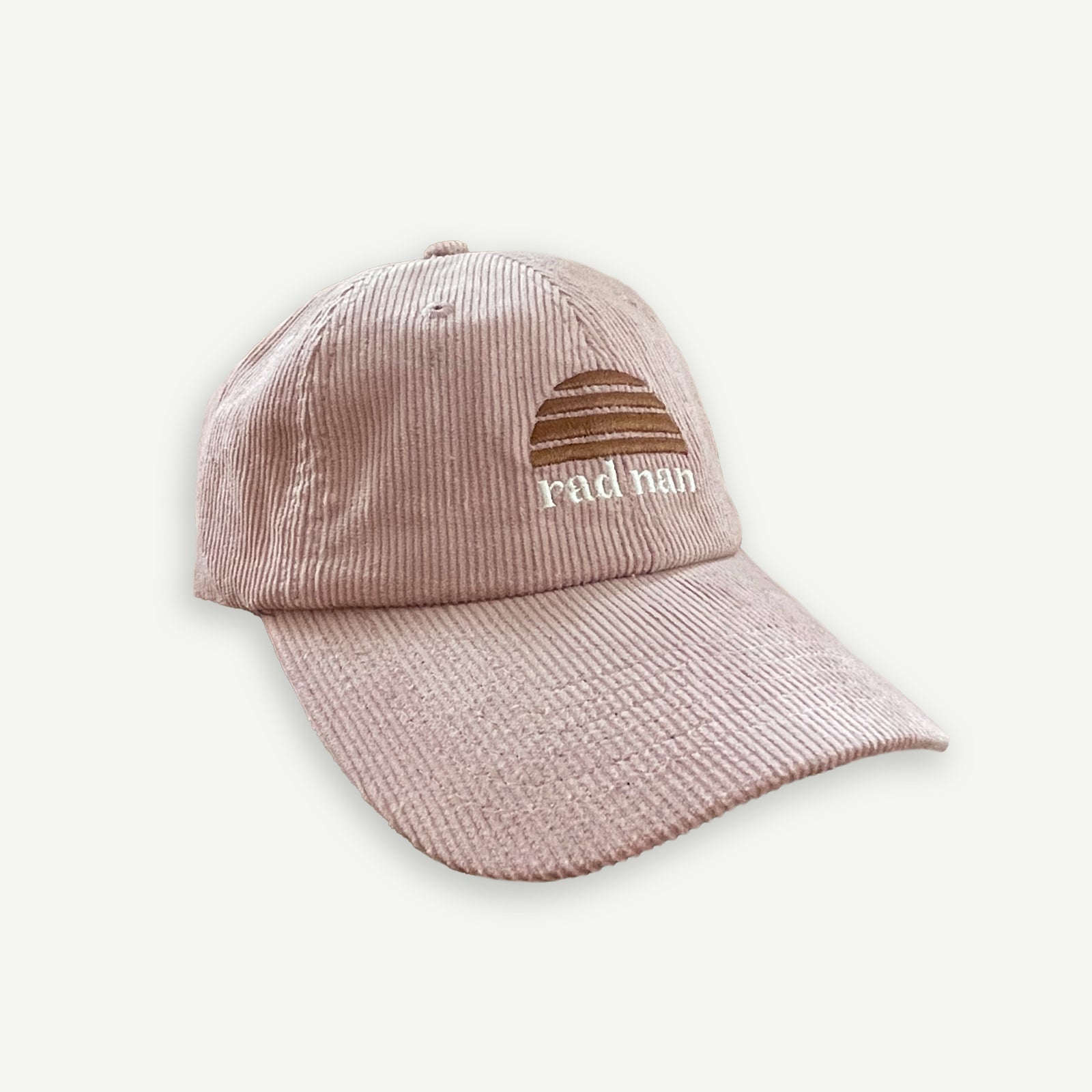 Rad Nan  Corduroy pink cap with embroidered Banabae sun logo in brown and rad nan embroidered underneath