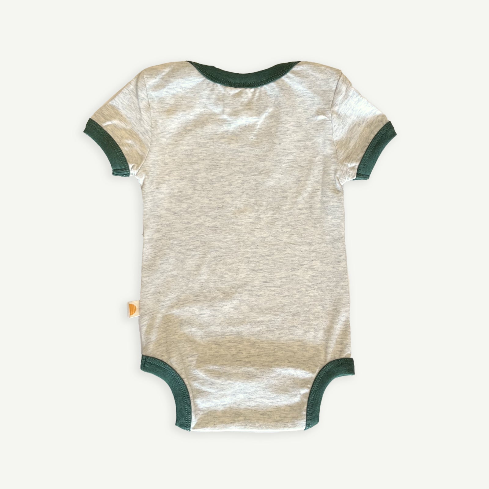 Back view of grey marl baby onesie with has contrast green bind at hem, sleeves and neckline.